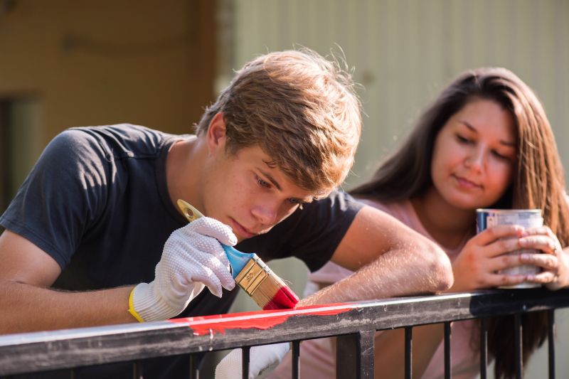 Local Wire Fence Painting pros at work